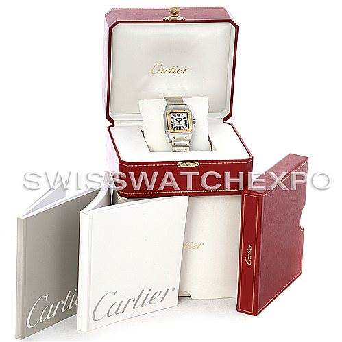 The image shows a Cartier Santos W20099C4 Men
s Stainless Steel Silver Dial W20099C4 Men
s Stainless Steel Silver Dial watch in its open box, accompanied by booklets and additional packaging.