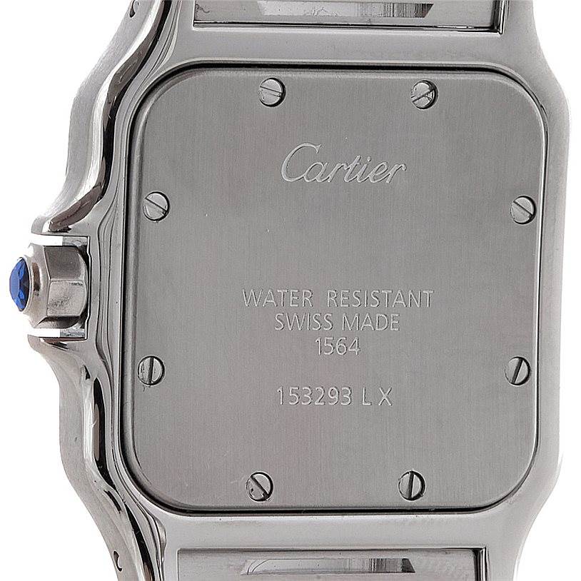 This image shows the back case of a Cartier Santos W20060D6 Men
s Stainless Steel Silver Dial W20060D6 Men
s Stainless Steel Silver Dial watch, including the engraved inscriptions and visible screws.