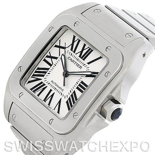 This image shows a close-up of the Cartier Santos W200737G Men
s Stainless Steel Silver Dial W200737G Men
s Stainless Steel Silver Dial watch, focusing on the dial, bezel, and part of the bracelet from a slight angle.
