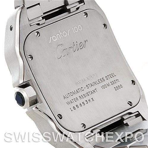 This image shows the back case of a Santos 100 Cartier watch, highlighting the engraving and water resistance details.