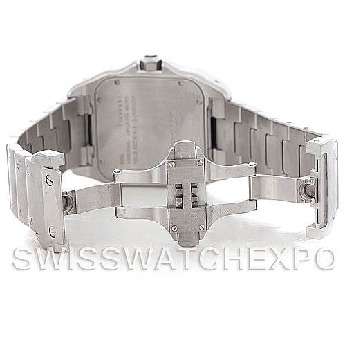 The image shows the open clasp and underside of the bracelet of a Santos model watch by Cartier, highlighting its deployment buckle.