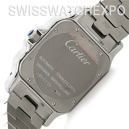 The image shows the back case of a Santos model by Cartier, highlighting its metal bracelet and text inscriptions.