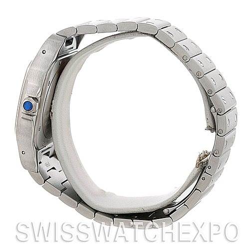 The image shows a side view of a Cartier Santos W20098D6 Men
s Stainless Steel Silver Dial W20098D6 Men
s Stainless Steel Silver Dial watch, highlighting its bracelet, case, and crown with a blue cabochon.