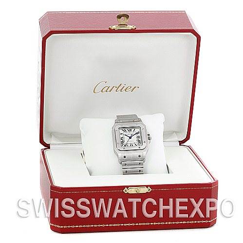 The image shows a Cartier Santos W20098D6 Men
s Stainless Steel Silver Dial W20098D6 Men
s Stainless Steel Silver Dial watch placed inside its open red presentation box.