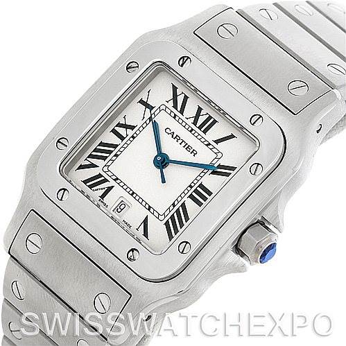 This image shows a Cartier Santos W20060D6 Men
s Stainless Steel Silver Dial W20060D6 Men
s Stainless Steel Silver Dial watch from a top angle, highlighting the watch face, bracelet, screws, and blue crown.