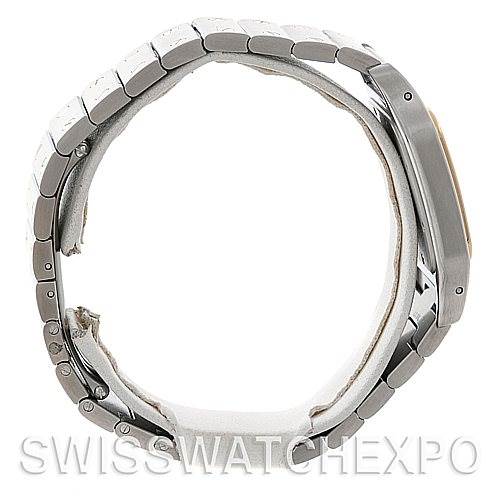 The image shows a side profile of a Cartier Santos W20011C4 Men
s Stainless Steel Silver Dial W20011C4 Men
s Stainless Steel Silver Dial watch, highlighting the bracelet links and the side of the case.