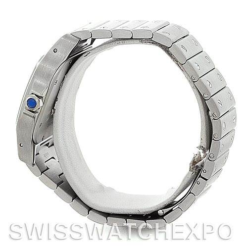 The image shows a side view of the Cartier Santos W20098D6 Men
s Stainless Steel Silver Dial W20098D6 Men
s Stainless Steel Silver Dial model watch, displaying the bracelet and crown with a blue cabochon.