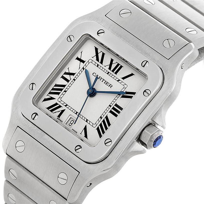 The image shows a close-up, angled view of the Cartier Santos W20060D6 Men
s Stainless Steel Silver Dial W20060D6 Men
s Stainless Steel Silver Dial watch, highlighting the face, bezel, crown, and part of the bracelet.
