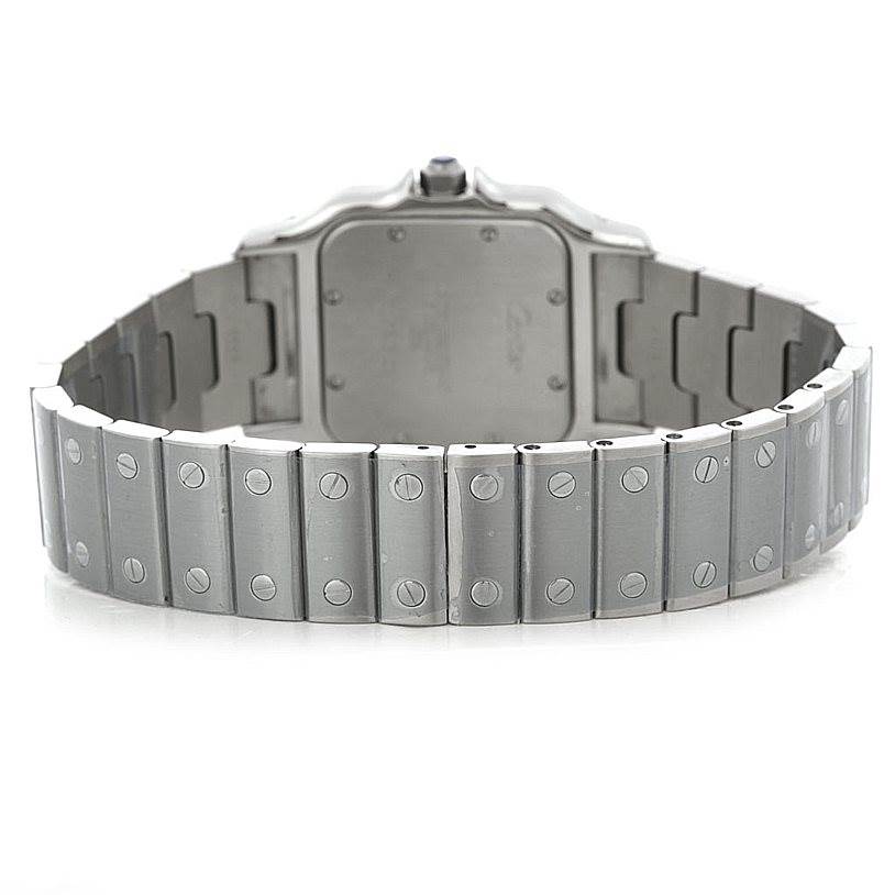 This image shows the back view of the Santos model by Cartier, highlighting its metal bracelet and clasp.