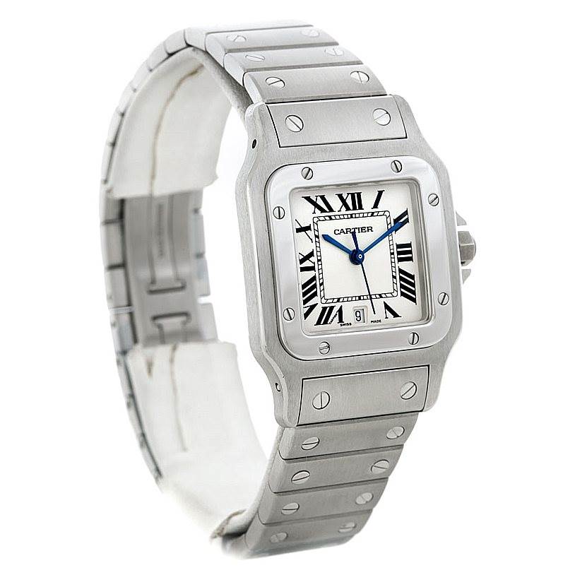 The image shows a Cartier Santos W20060D6 Men
s Stainless Steel Silver Dial W20060D6 Men
s Stainless Steel Silver Dial watch at a three-quarter angle, highlighting its face, bezel, and metal bracelet.
