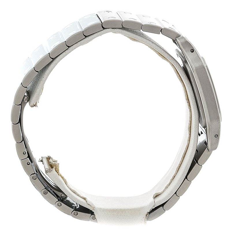 The image shows a side angle of the Cartier Santos W20060D6 Men
s Stainless Steel Silver Dial W20060D6 Men
s Stainless Steel Silver Dial model watch, highlighting the side of the case and bracelet links.