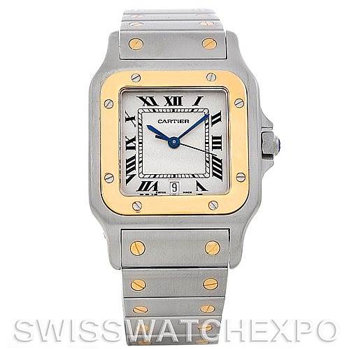 The image shows a front view of a Cartier Santos W20011C4 Men's Stainless Steel Silver Dial W20011C4 Men's Stainless Steel Silver Dial watch, highlighting its square face, Roman numerals, and metal bracelet with gold screws.