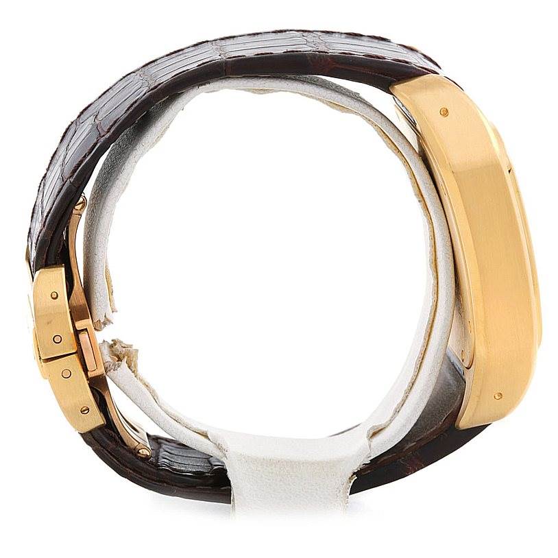 The Cartier Santos W20071Y1 Men's Yellow Gold Silver Dial W20071Y1 Men's Yellow Gold Silver Dial watch is shown from a side view, highlighting the strap and side of the case.