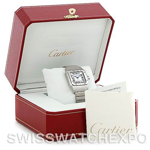 The image shows a Cartier Santos W20098D6 Men
s Stainless Steel Silver Dial W20098D6 Men
s Stainless Steel Silver Dial watch in its red display box, along with associated documentation.