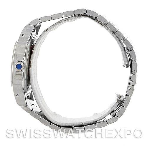 The image shows a Cartier Santos W20098D6 Men
s Stainless Steel Silver Dial W20098D6 Men
s Stainless Steel Silver Dial watch from a side view, highlighting the casing and the metal bracelet.