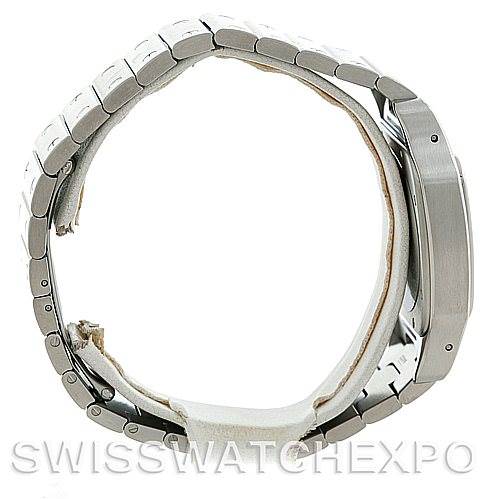 The image shows a side profile of a Cartier Santos W20098D6 Men
s Stainless Steel Silver Dial W20098D6 Men
s Stainless Steel Silver Dial watch, highlighting its metal bracelet and case.