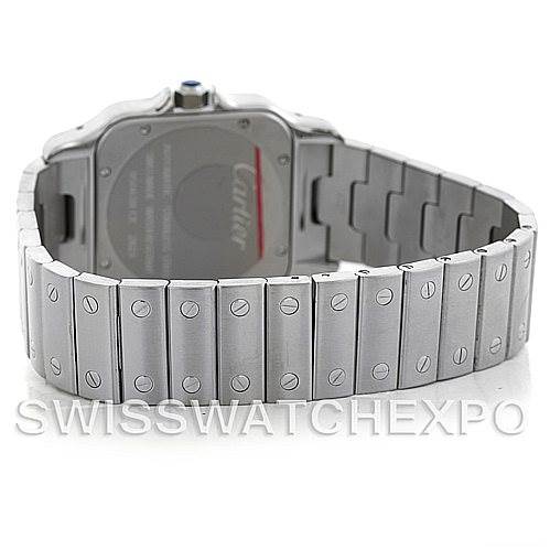 The image shows the back and bracelet of a Santos model watch by Cartier at an angled rear view.