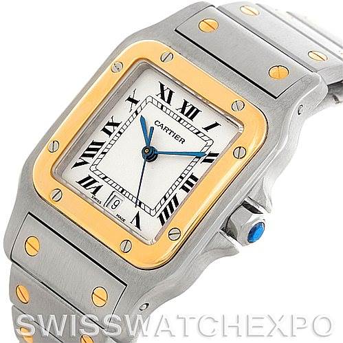 The image shows a Cartier Santos W20011C4 Men's Stainless Steel Silver Dial W20011C4 Men's Stainless Steel Silver Dial watch from a 3/4 angle, highlighting the face, bezel, and part of the bracelet.