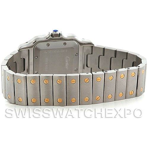 The image shows the back and bracelet of a Cartier Santos W20058C4 Men
s Stainless Steel Silver Dial W20058C4 Men
s Stainless Steel Silver Dial watch, displaying its metal links with gold screws and part of the case back.