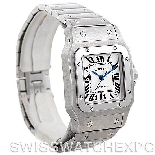 The image shows a Cartier Santos W20098D6 Men
s Stainless Steel Silver Dial W20098D6 Men
s Stainless Steel Silver Dial model watch from a three-quarter front angle, displaying its face, bezel, and bracelet.