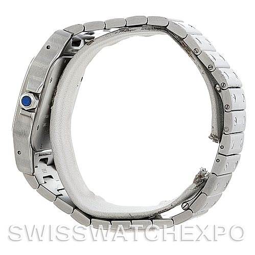 The image shows a side view of the Cartier Santos W20098D6 Men
s Stainless Steel Silver Dial W20098D6 Men
s Stainless Steel Silver Dial watch, highlighting its bracelet and crown with a blue cabochon.