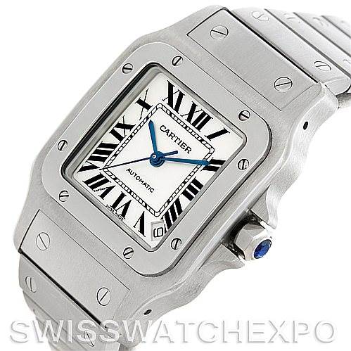 The image shows a close-up, angled view of a Cartier Santos W20098D6 Men
s Stainless Steel Silver Dial W20098D6 Men
s Stainless Steel Silver Dial watch displaying the face, bezel, and part of the bracelet.