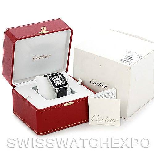 The image shows a Cartier Santos W20121U2 Men
s Stainless Steel Silver Dial W20121U2 Men
s Stainless Steel Silver Dial watch in its open red box, accompanied by its outer box and documentation.