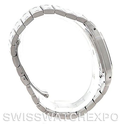 A side view of a Cartier Santos W20060D6 Men's Stainless Steel Silver Dial W20060D6 Men's Stainless Steel Silver Dial watch, showing the metal bracelet, clasp, and part of the watch case.