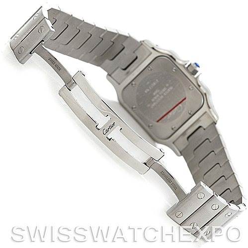 The image shows the back and clasp of a Santos model watch by Cartier, highlighting its stainless steel bracelet and deployment clasp.