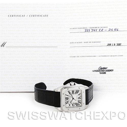 The image shows a Cartier Santos W20073X8 Men's Stainless Steel Silver Dial W20073X8 Men's Stainless Steel Silver Dial watch with a black leather strap set against its certificate of authenticity and purchase documentation.