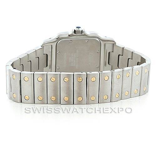 This image shows the back view of a Cartier Santos W20011C4 Men
s Stainless Steel Silver Dial W20011C4 Men
s Stainless Steel Silver Dial watch, focusing on the case back and the bracelet with gold screws.