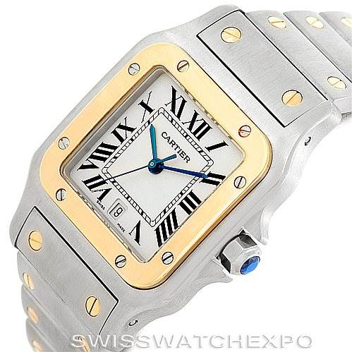 This image shows a close-up of a Cartier Santos W20011C4 Men
s Stainless Steel Silver Dial W20011C4 Men
s Stainless Steel Silver Dial watch, displaying the bezel, dial, crown, and part of the bracelet.