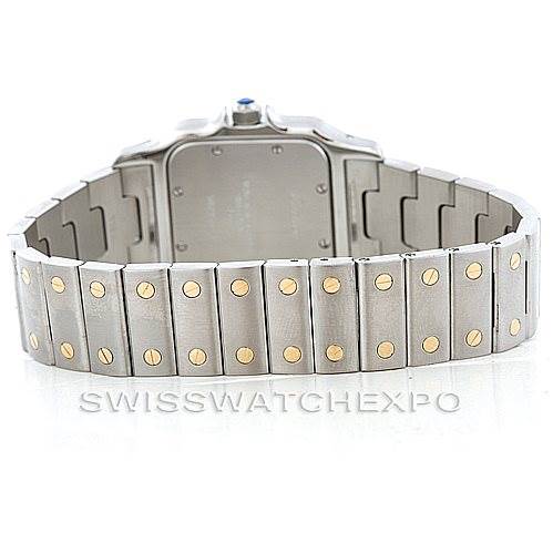The image shows the back view of a Santos model by Cartier, focusing on the metal bracelet with gold screws.