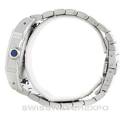 The image shows a side view of a Cartier Santos W200737G Men's Stainless Steel Silver Dial W200737G Men's Stainless Steel Silver Dial watch, highlighting the metal bracelet and crown with a blue gem.