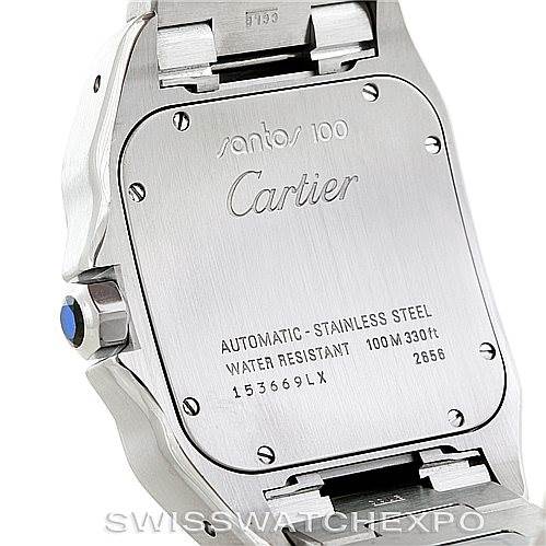 The image shows the case back of the Santos 100 model by Cartier, focusing on its inscriptions and stainless steel construction.