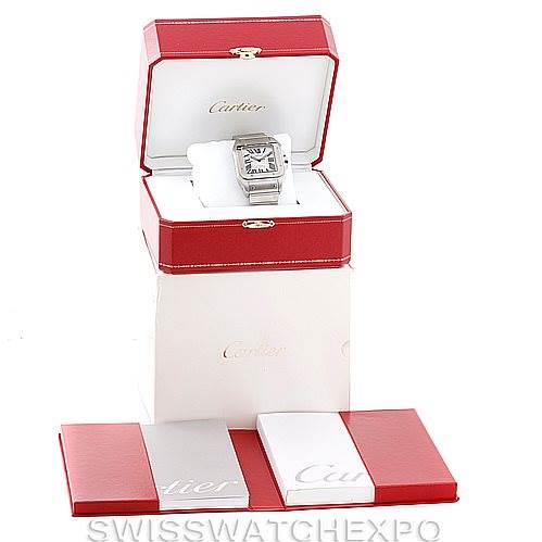 The image shows a Cartier Santos W200737G Men's Stainless Steel Silver Dial W200737G Men's Stainless Steel Silver Dial watch in its open red box, accompanied by additional packaging and booklets underneath.
