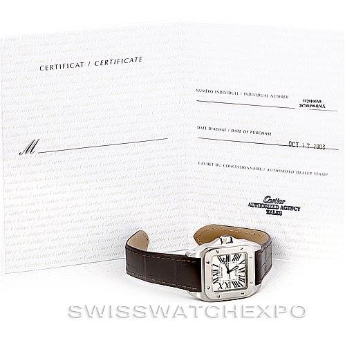 The image shows a Cartier Santos W20106X8 Men
s Stainless Steel Silver Dial W20106X8 Men
s Stainless Steel Silver Dial watch with a brown leather strap, angled slightly upward, alongside its certificate of Best Quality
ity.