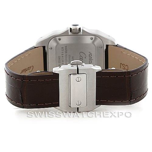 This image shows the backside of a Cartier Santos W20106X8 Men
s Stainless Steel Silver Dial W20106X8 Men
s Stainless Steel Silver Dial watch, highlighting its leather strap and clasp mechanism.