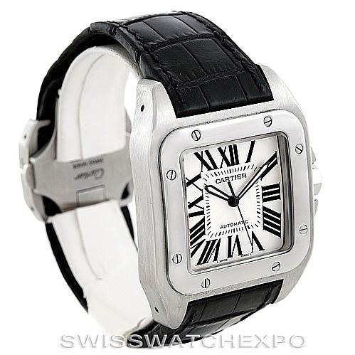 The image shows a Cartier Santos W20073X8 Stainless Steel Silver Dial W20073X8 Stainless Steel Silver Dial model watch from a front-angle perspective, highlighting its square dial, Roman numerals, and black leather strap.