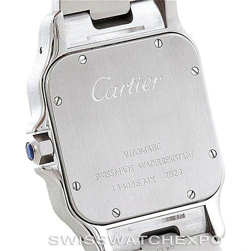 The image shows the back case of a Cartier Santos W20099C4 Men
s Stainless Steel Silver Dial W20099C4 Men
s Stainless Steel Silver Dial watch, displaying detailed engravings and the case screws.