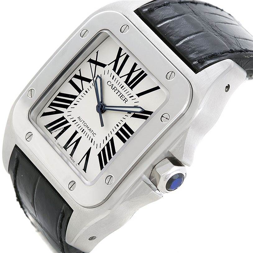 The image shows a close-up angle of the face and side of the Cartier Santos W20073X8 Men's Stainless Steel Silver Dial W20073X8 Men's Stainless Steel Silver Dial watch, highlighting the dial, bezel, crown, and leather strap.