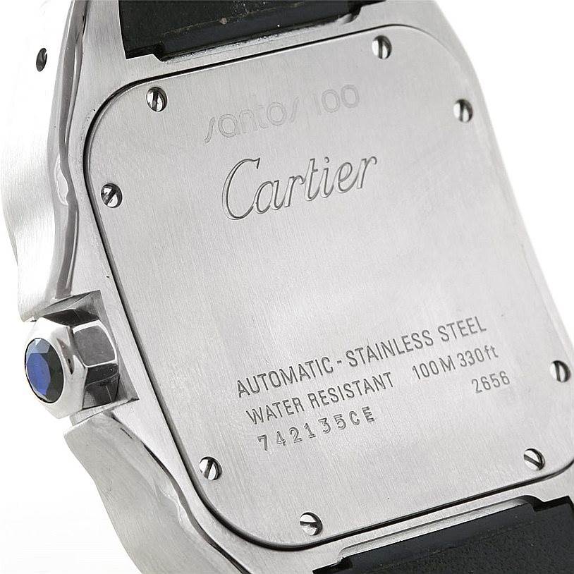The image shows the back case and side view of the Santos model watch by Cartier, highlighting its stainless steel finish and engravings.