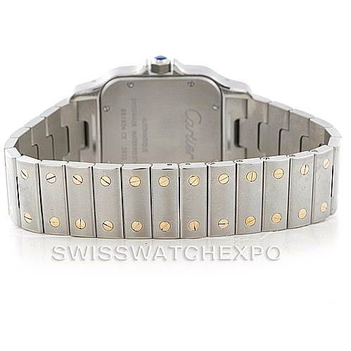 The image shows the back view of a Cartier Santos W20099C4 Men
s Stainless Steel Silver Dial W20099C4 Men
s Stainless Steel Silver Dial model watch, highlighting its stainless steel and gold bracelet.