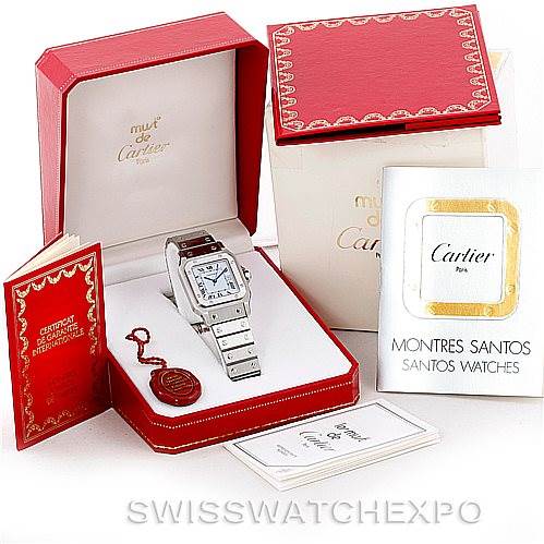 This image shows a Cartier Santos Men
s Stainless Steel White Dial Men
s Stainless Steel White Dial watch at an angle displaying the face and bracelet, with its box, manual, and certificate included.