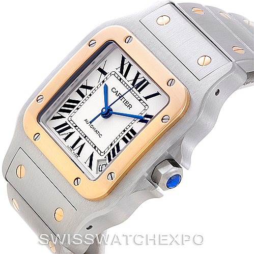 This image shows a side angle of a Cartier Santos W20099C4 Men's Stainless Steel Silver Dial W20099C4 Men's Stainless Steel Silver Dial watch featuring its square dial, golden bezel, and detailed bracelet elements.