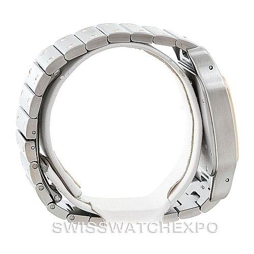 This image shows a side view of the Santos model by Cartier, highlighting the watch's metal bracelet and case profile.