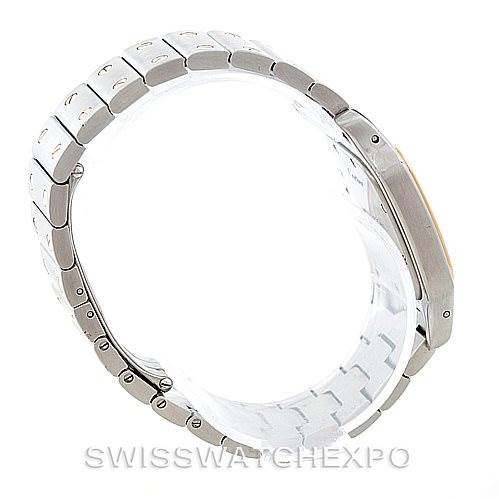 The image shows a side profile of the Santos model by Cartier, focusing on the watch band
s side and the case
s thickness.
