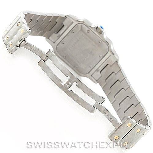The image shows the open clasp mechanism and back case of a Santos model watch by Cartier.