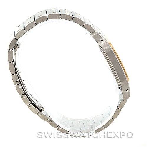 This image shows a Cartier Santos W20011C4 Men
s Stainless Steel Silver Dial W20011C4 Men
s Stainless Steel Silver Dial watch from the side, highlighting its stainless steel bracelet and clasp.