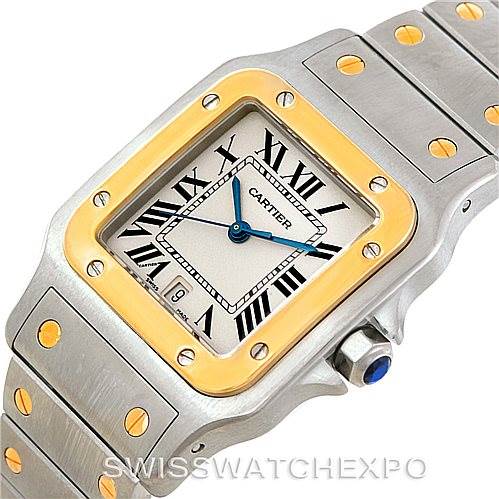 The image shows a Cartier Santos W20011C4 Men
s Stainless Steel Silver Dial W20011C4 Men
s Stainless Steel Silver Dial watch from a slightly tilted top-down angle, highlighting the face, bezel, and part of the bracelet.
